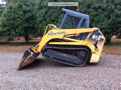 mustang skid steer with tracks|who makes mustang skid steers.